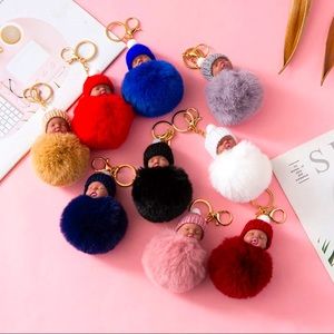 Sleeping baby doll keychain